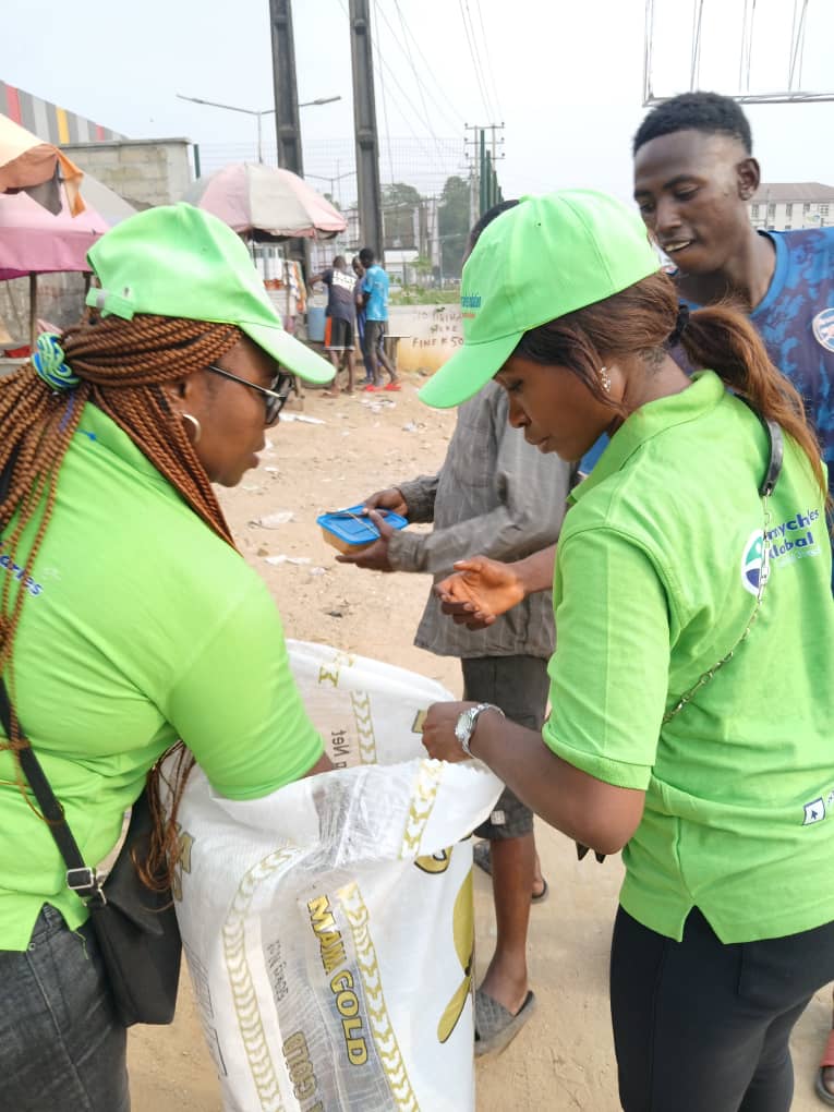Children receiving food and care during outreach